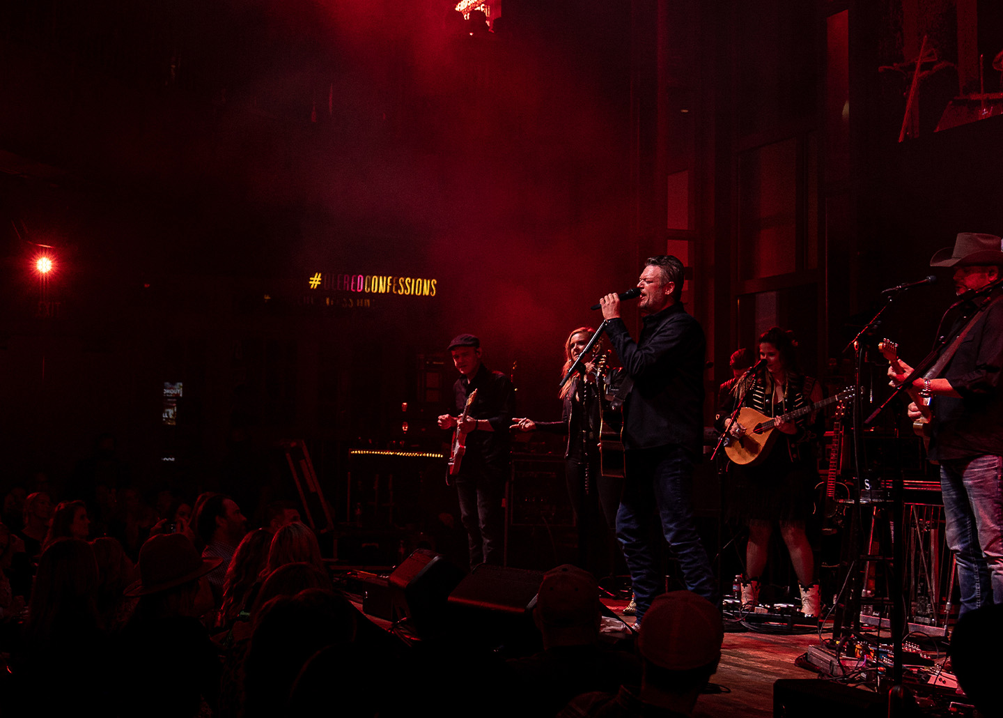 Blake Shelton on stage with his band
