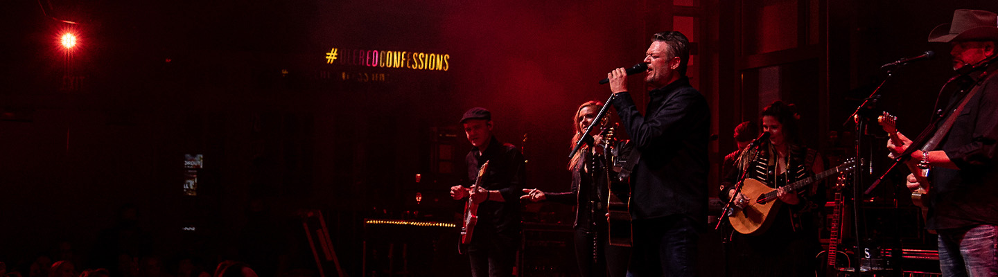 Blake Shelton on stage with his band.